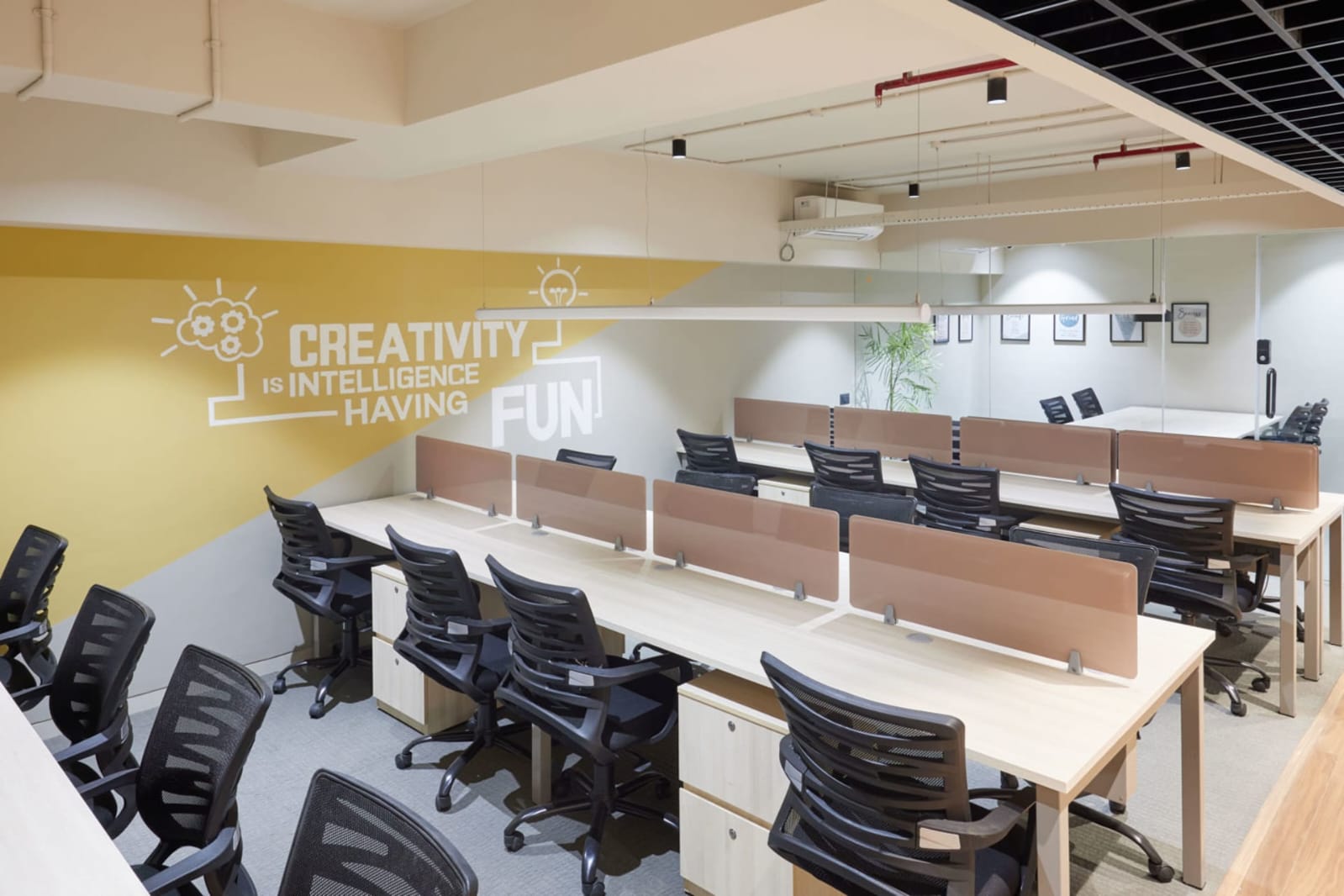 Hot desk coworking area at Click Office Noida Sector 2